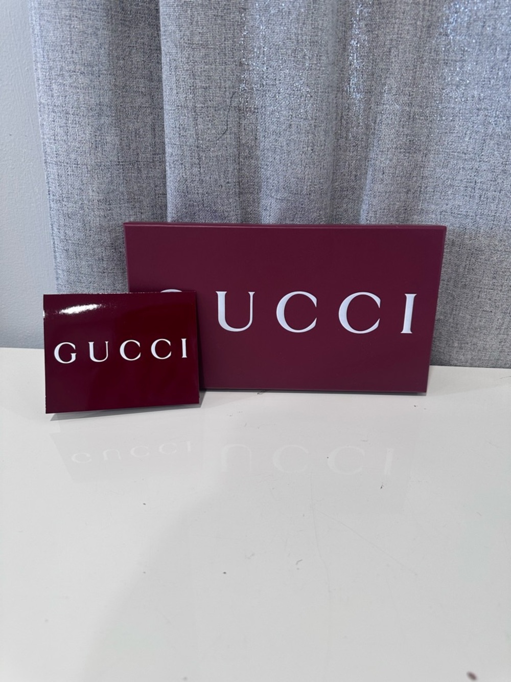 Authentic Gucci burgundy empty tie box with receipt holder.